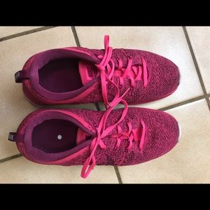 size 8. Pink Nike flyknit Lunar shoes